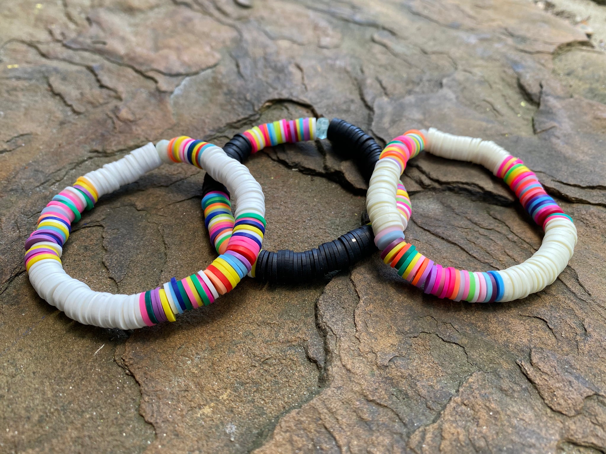 Rainbow Disc Bead Bracelets - 12 Pc.